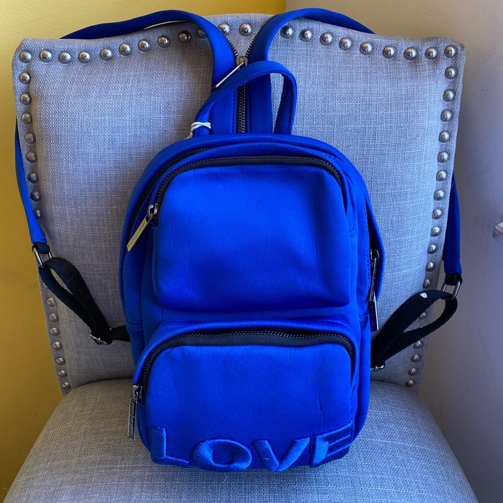 Peace Love World Convertible Sling/Backpack